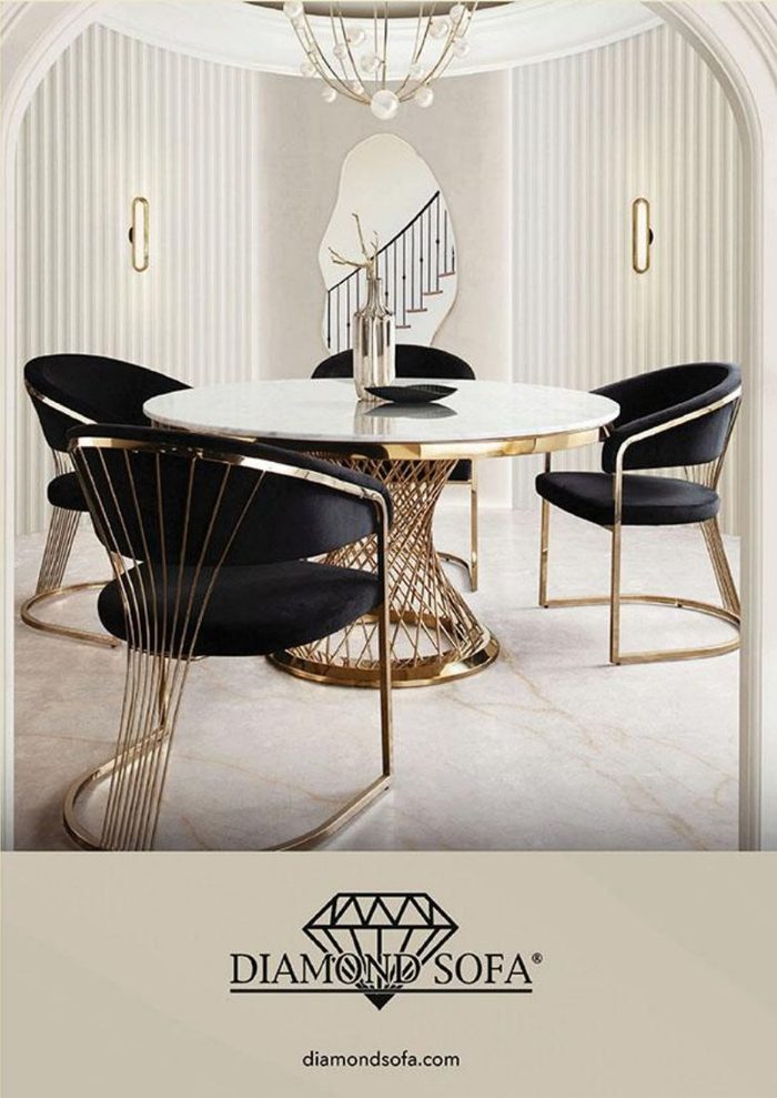 Diamond Sofa — gold and black velvet dining chairs around a marble table. diamondsofa.com