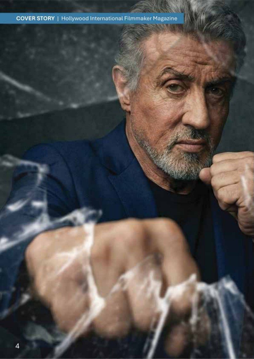 Sylvester Stallone in a boxing stance, punching through glass