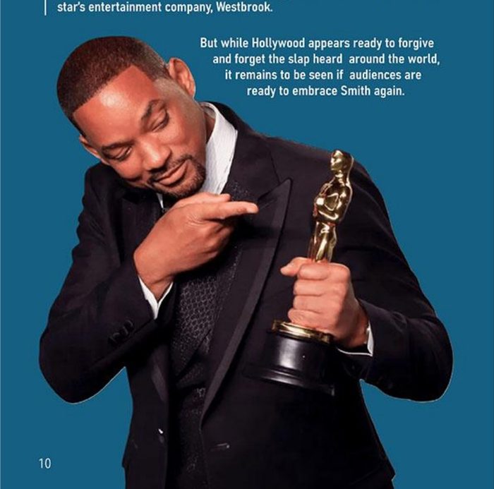 Will Smith holding an Oscar statuette